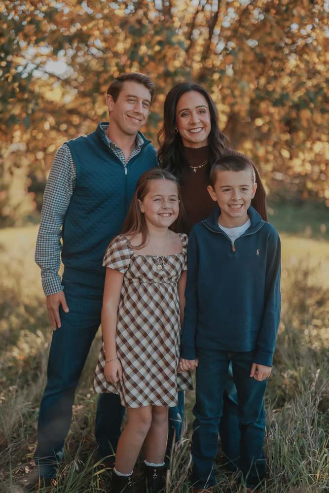 A family of four in the golden evening light