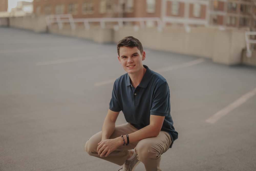 Crouched on the parking deck downtown