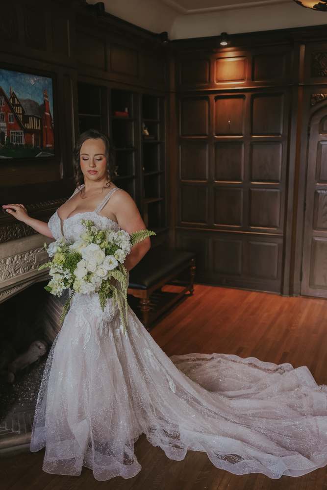 The bride in the wood-panelled library