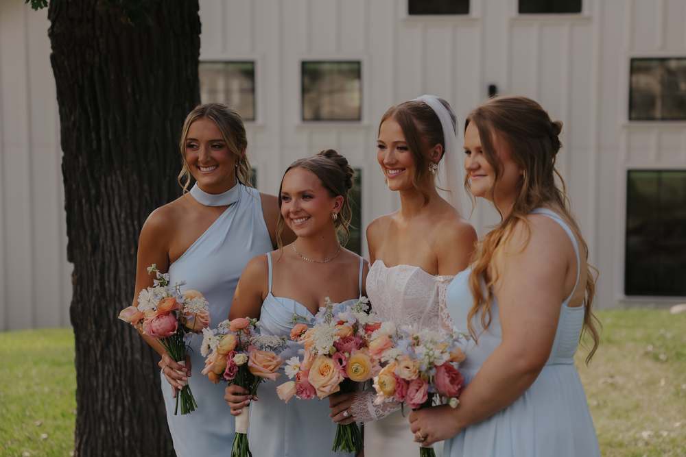 Bridesmaids beneath the oak tree