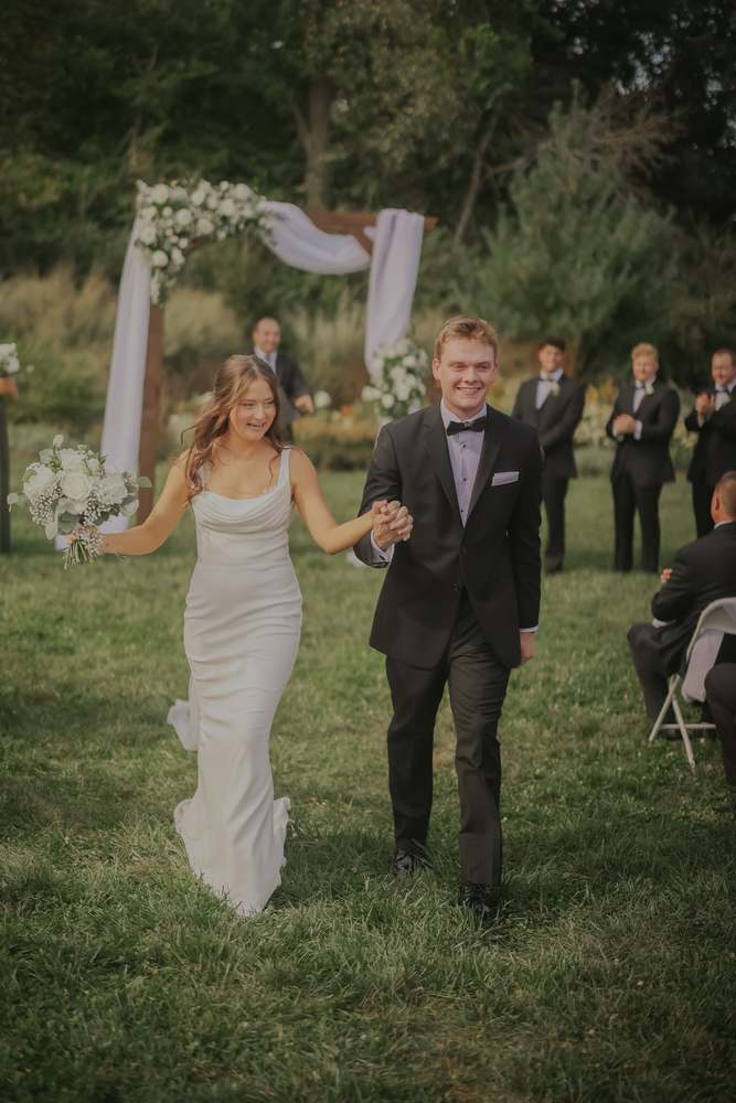 The recessional through cheering guests
