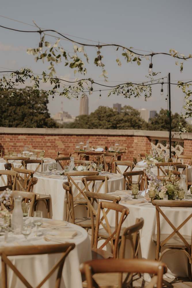 String lights above the courtyard tables