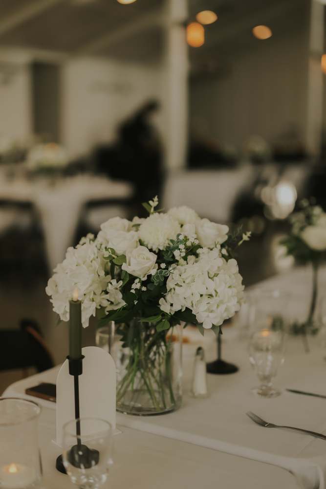 White hydrangea centerpiece in the reception hall